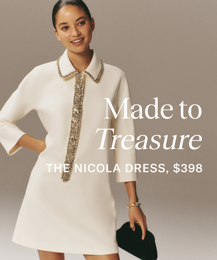 Woman in a white long-sleeved mini dress with sparkles on the collar. Copy on the image says made to treasure, the Nicola dress, $398.