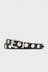 The Petit Moments black studded belt features large silver studs and a sleek silver buckle, making it a stylish and adjustable waist accessory for women's fashion.