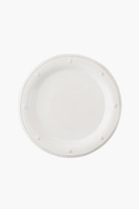 A round, plain white ceramic stoneware dinner plate by Juliska featuring Berry & Thread's raised dotted and rope-like border design, viewed from above.
