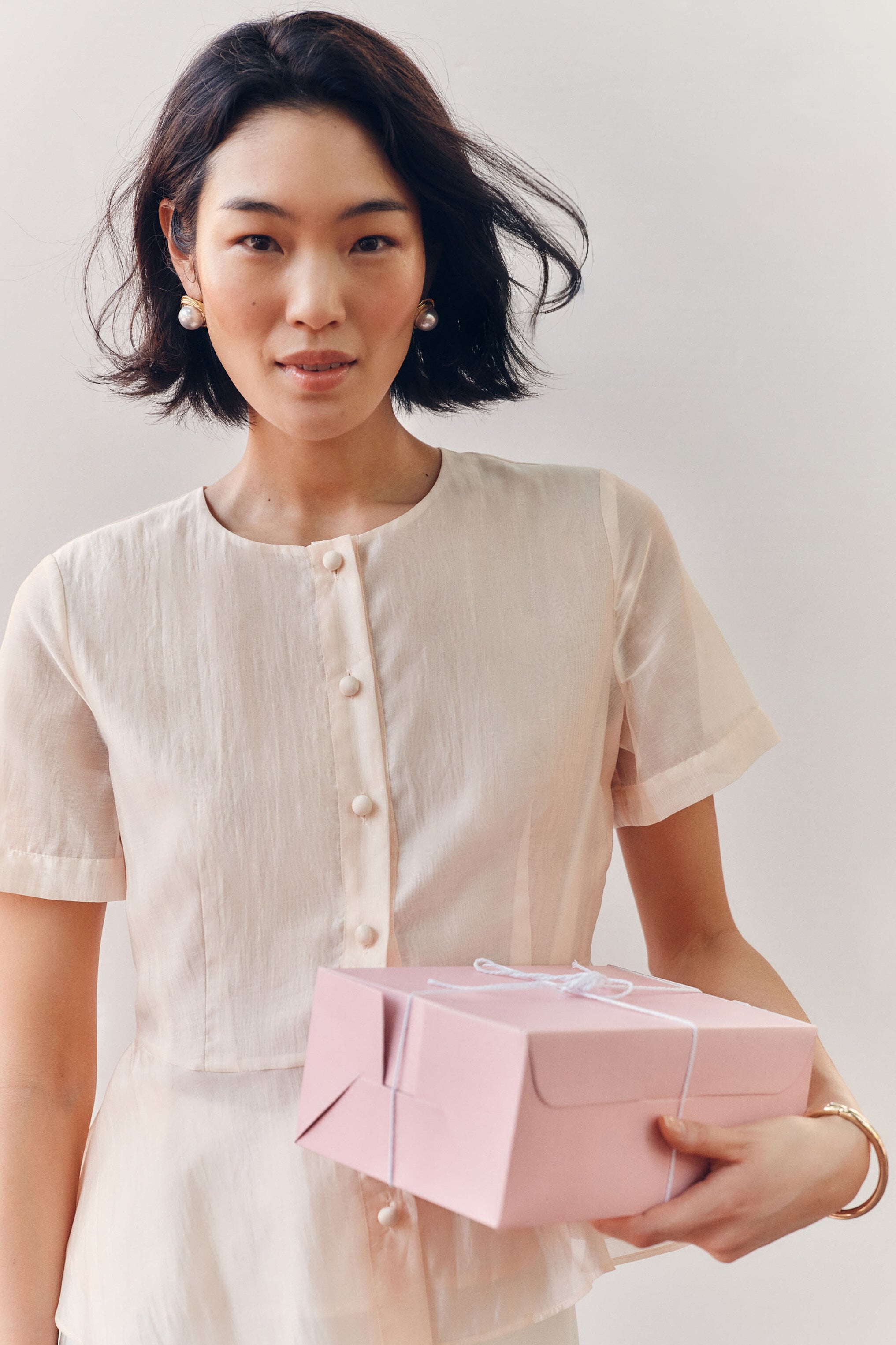 Peach Dust Organza Peplum Sylvette Blouse | Tuckernuck