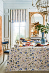 Classic dining room showcasing the Blue and Lavender Blossom Tablecloth, effortlessly draped with elegant dishes and decor, embodying a high-end, fun ambiance.