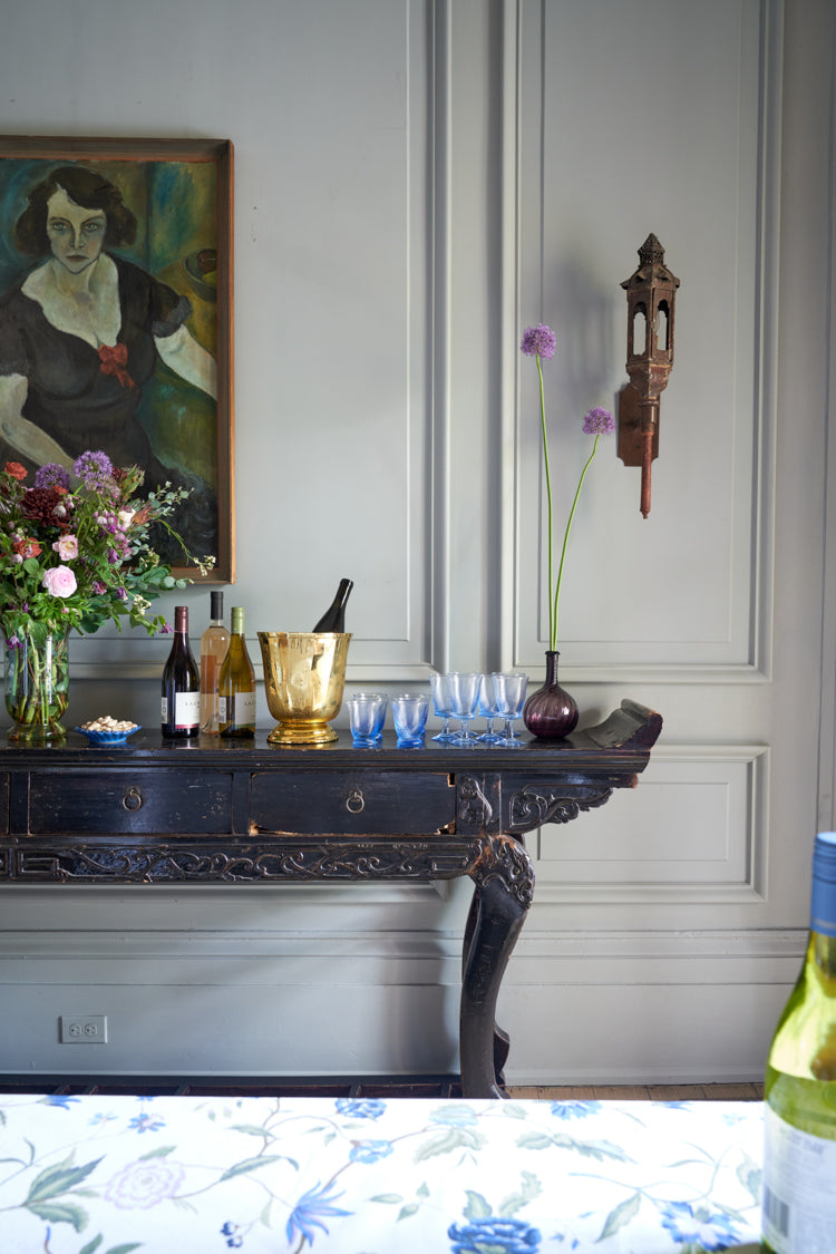 Vita Large Ice Bucket with faceted design on elegant bar console; a classic, high-end piece for effortless entertaining.
