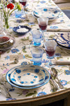 Blue Flower Dessert Plate on an elegantly set table with floral motifs, classic blue-tinted glassware, and polished flatware, creating an effortless, high-end dining experience.