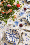Blue Stripe Dinner Plate with classic stripe-and-vine design, set on elegant table with floral centerpiece and stemmed glasses, embodying effortless, high-end dining for fun occasions.