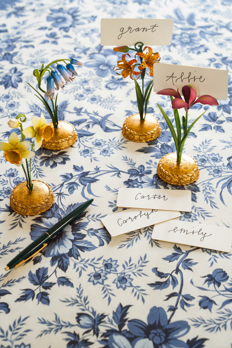 Classic and high-end Orange Meadow Walk Tiger Lily Place Card Holder, effortlessly displaying handwritten guest cards with whimsical floral elegance, embodying fun and sophisticated charm.