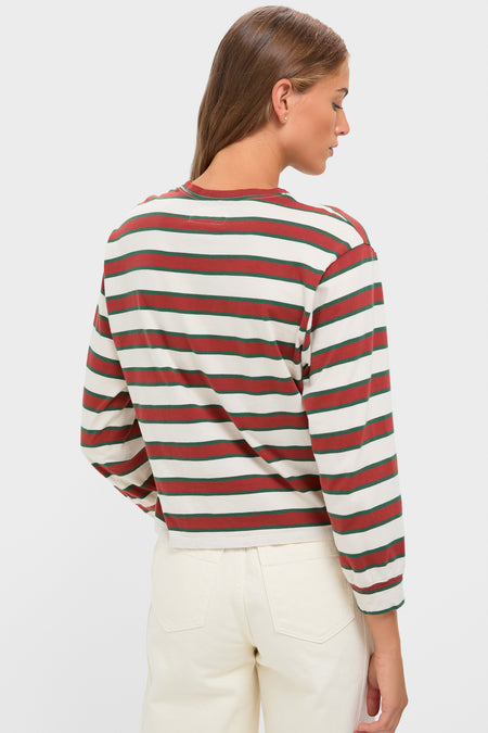 Model wearing the Cream with Brown Campus Crew, a classic, relaxed-fit striped shirt with fitted cuffs, embodying an effortless, high-end style. Perfect for a fun, collegiate look.