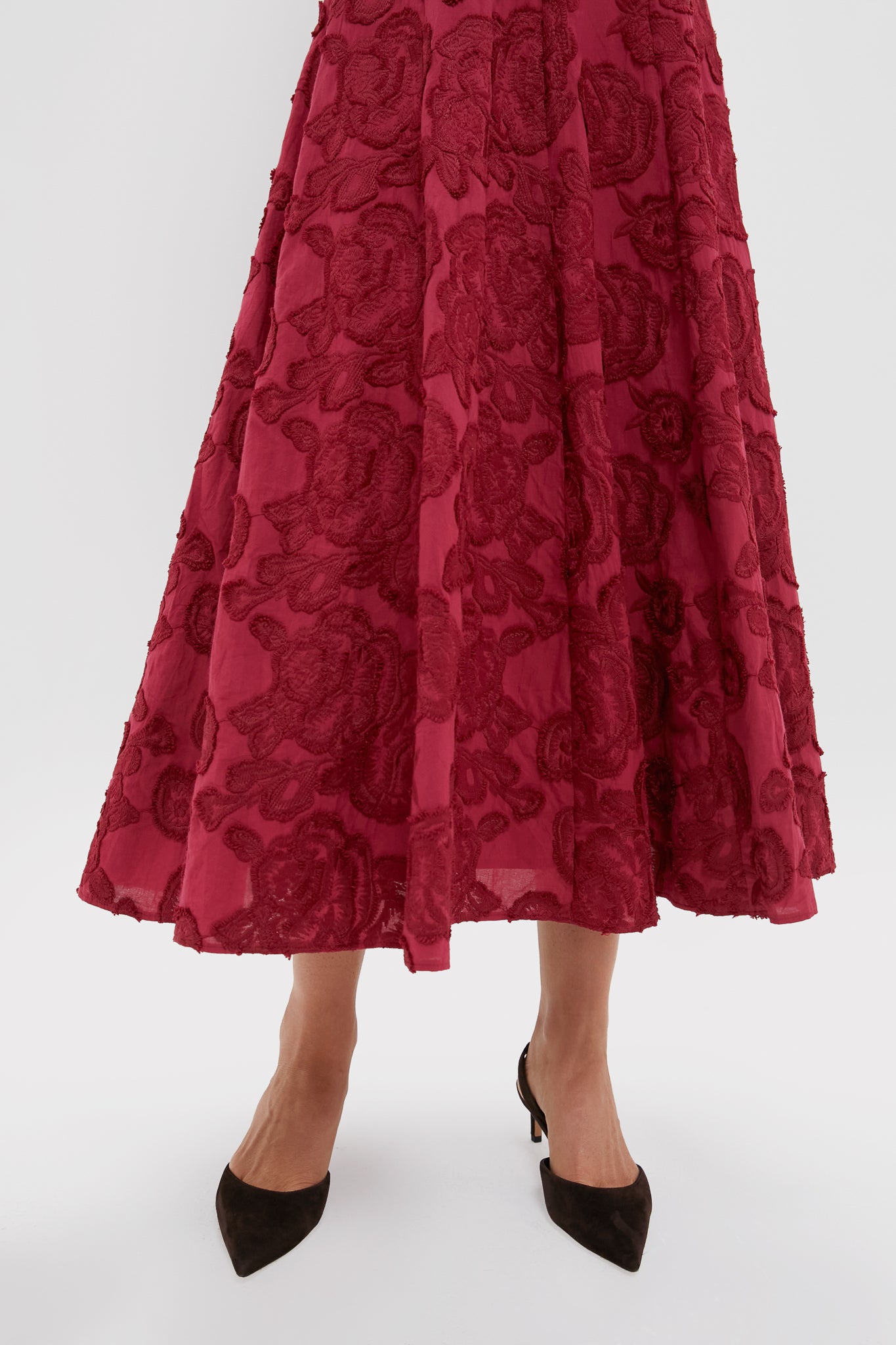 Ruby Textured Floral Melina Maxi Dress: Classic and high-end, showcasing floral embroidery and an effortless A-line silhouette with fun, black suede pointed-toe slingback heels.