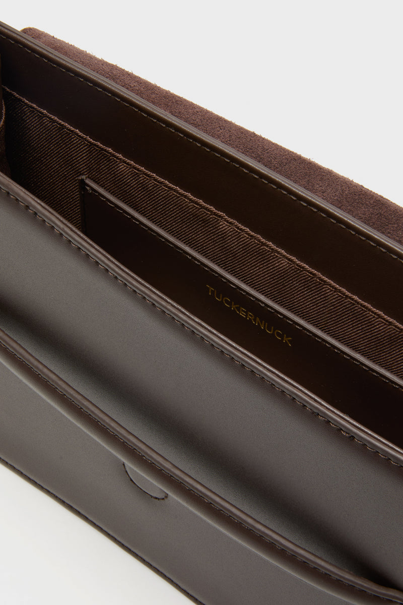 Brown Leather Stevie Crossbody, featuring a smooth leather interior, suede-textured upper edge, and built-in card slots, exudes classic, effortless style for high-end, fun fashion.