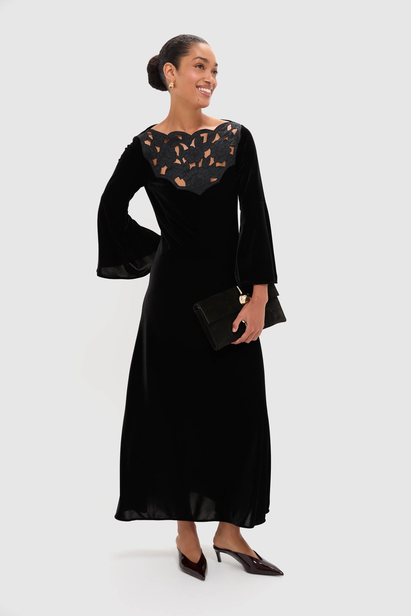 Accademia Black Velvet Bell Sleeve Catherine Maxi Dress exudes classic elegance with a floral lace yoke, effortless velvet fabric, and fun flared sleeves, epitomizing high-end style.