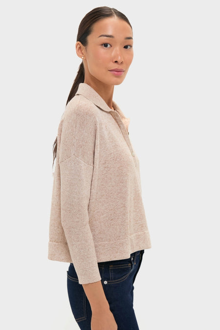 Tan Clayton Long Sleeve Knit Polo features a classic, effortless style, showcasing a spread collar, partial button placket, and boxy, slightly cropped fit, perfect for a high-end, fun look.