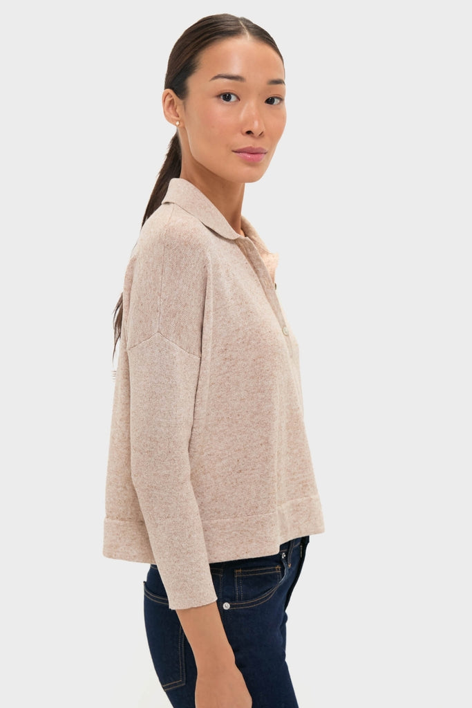 Tan Clayton Long Sleeve Knit Polo features a classic, effortless style, showcasing a spread collar, partial button placket, and boxy, slightly cropped fit, perfect for a high-end, fun look.