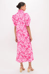 Model in classic, high-end Pink Textured Floral Ruffle Collar Louisa Maxi Dress with puff sleeves and sandals, showcasing effortless fun style. Perfect for versatile, everyday elegance.