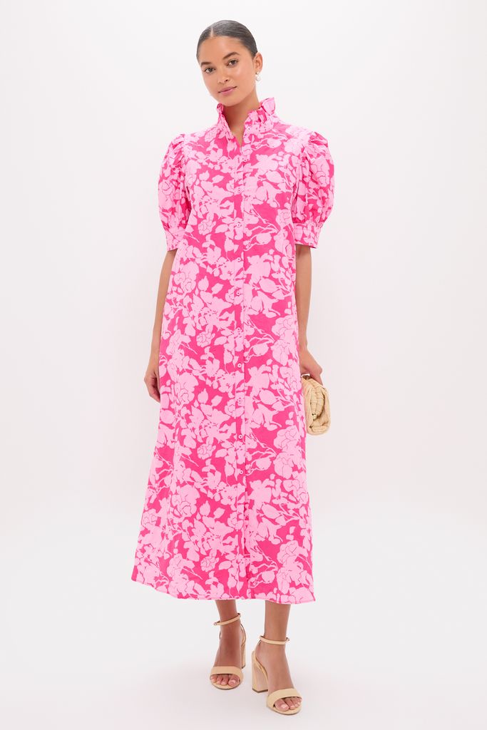 Woman modeling the Pink Textured Floral Ruffle Collar Louisa Maxi Dress, showcasing its classic, effortless style with puff sleeves and a fun, high-end floral print.