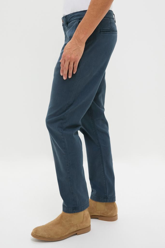 Classic and effortless, the Blue Nights Coastline Chino offers high-end comfort and versatility, showcased with light tan Chelsea boots for a fun, everyday look.