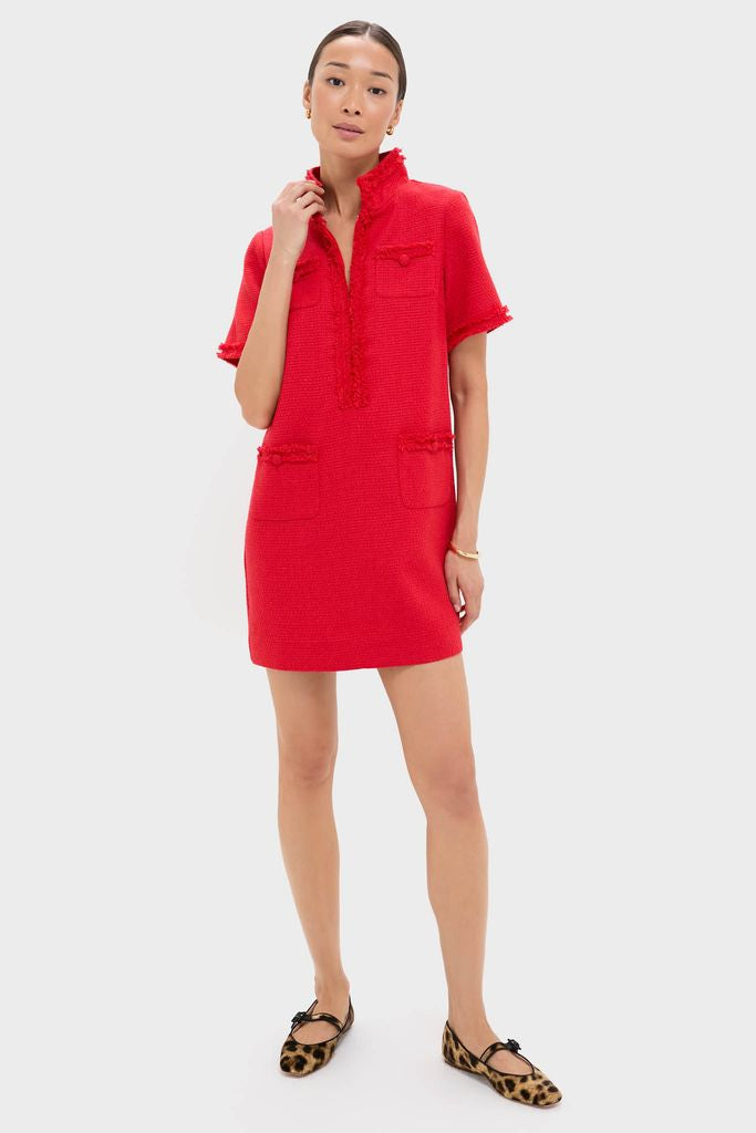 Woman models the Red Tweed Ophelia Dress, a classic shift mini with fringe details, four pockets, and an open collar, styled effortlessly with gold hoops and leopard flats.