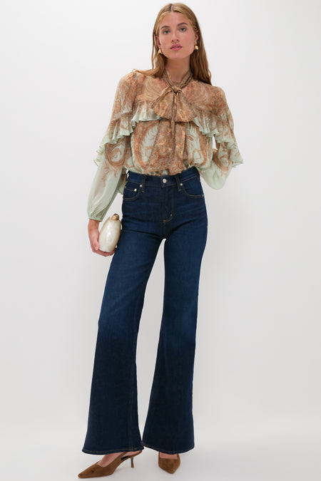 Model showcases the classic Hazelwood Sling Back Cashel Heels, effortlessly styled with a chic blouse and jeans, exuding a fun, high-end, and versatile elegance.