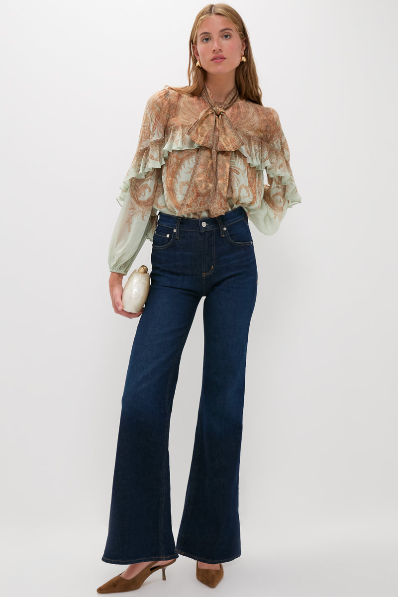 Model showcases the classic Hazelwood Sling Back Cashel Heels, effortlessly styled with a chic blouse and jeans, exuding a fun, high-end, and versatile elegance.