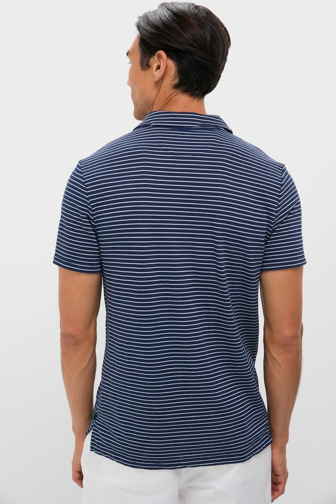 Man wearing a classic Striped Navy Stretch Linen Polo, showcasing effortless style with its breathable fabric and high-end design, perfect for fun, versatile occasions.