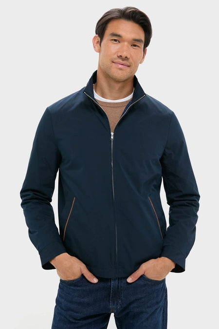 Model wearing the classic Navy Blue Stanley Jacket; a high-end, effortless piece with suede-trimmed pockets, perfect for versatile, fun outings and modern style.