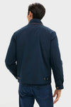 Back view of the Navy Blue Stanley Jacket, featuring buttoned tabs and suede-trimmed pockets, embodying a classic, effortless, and high-end style.