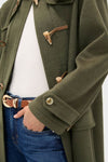 Olive Green Arthur Toggle Stadium Coat exudes classic, effortless style with horn toggle closures and buttoned cuffs, perfect for high-end, fun winter outings.