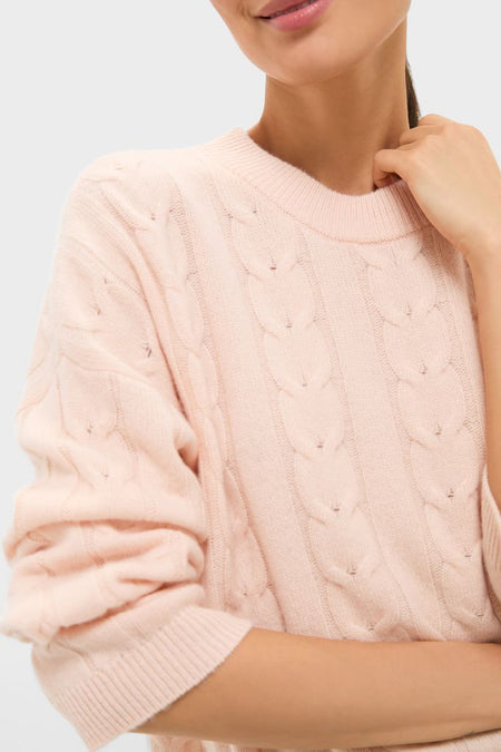 Soft Pink Cashmere Eloise Cable Knit Sweater showcasing a classic, effortless style with a cable pattern, crew neck, and relaxed fit for a high-end, fun look.