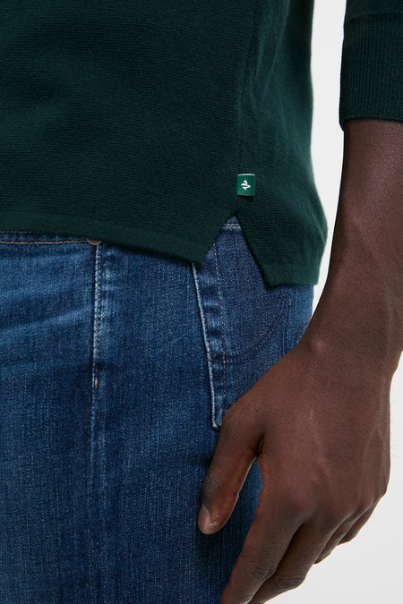 Forest Green Merino Cardigan with classic waffle weave and ribbed finishes, effortlessly blending shirt structure with sweater comfort, embodying high-end, fun style.