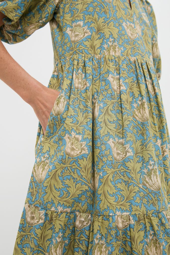 Blue & Green Leafy Floral Cisco Maxi Dress with a gathered waist and side pockets, showcasing classic, effortless style with a fun, high-end leafy floral print.