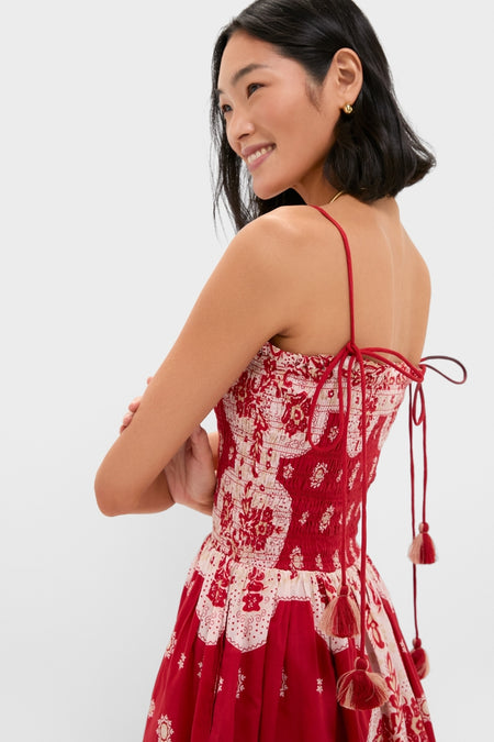 Merida Lava Bandana Dress: A classic, effortless mini with smocked bodice and tasseled ties. Perfect for fun, high-end style and adventure.