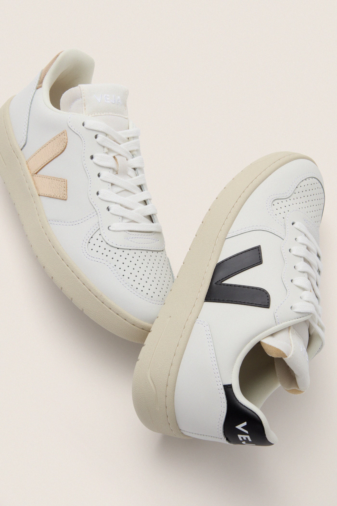 Veja Extra White Platine V-10 Sneakers with chic off-white leather, metallic rose-gold and black logos. Classic, effortless design, perfect for a fun, high-end casual look.