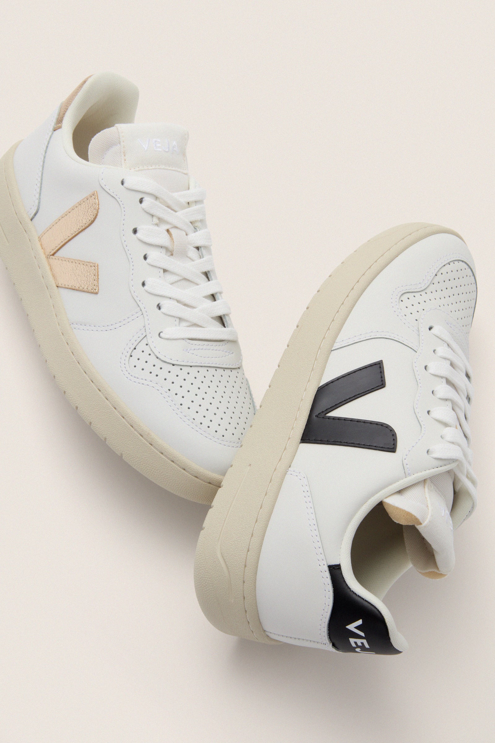 Veja Extra White Platine V-10 Sneakers with chic off-white leather, metallic rose-gold and black logos. Classic, effortless design, perfect for a fun, high-end casual look.