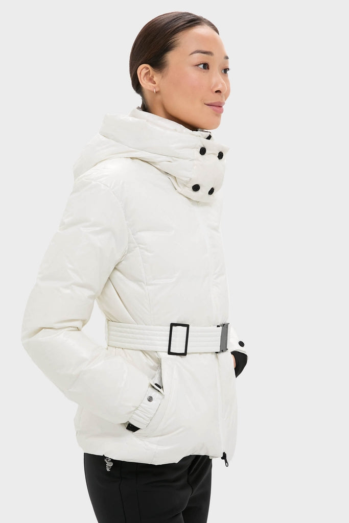 Model wearing the Snow White Candice Ski Parka, showcasing its high-neck, quilted belt, and side pocket, epitomizing classic, high-end, effortless winter style.