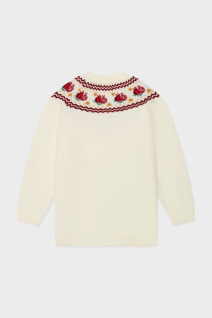 Ivory Grenada Fair Isle Merino Wool Girl Jumper, featuring a classic round yoke with intricate strawberry motifs, offers an effortless, high-end style with blouson sleeves.
