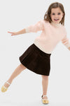 Young girl joyfully poses in a classic, fun Girls Pleated Corduroy Skirt, embodying effortless style and high-end craftsmanship, perfect for special moments.
