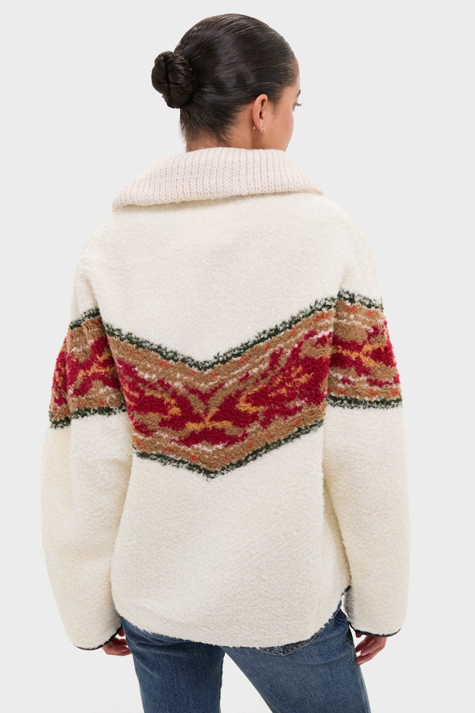Ecru Marner Pullover: Classic sherpa jacket with a folded collar, featuring bold, V-shaped patterning. Effortlessly paired with jeans for a fun, high-end look.