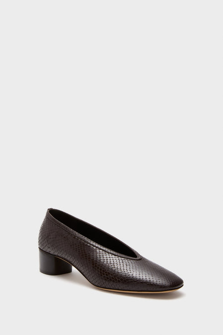 Printed Python Luna Pumps: Classic, low-heeled women's shoe with subtle snakeskin texture, almond toe, and block heel. Effortless high-end style for work or play.