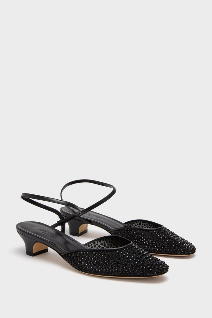 Black Crystals Erika Pump Sandals feature classic, effortless design with pointed-toe, low kitten heels, and fun black rhinestone-studded uppers, offering a high-end, sophisticated look.