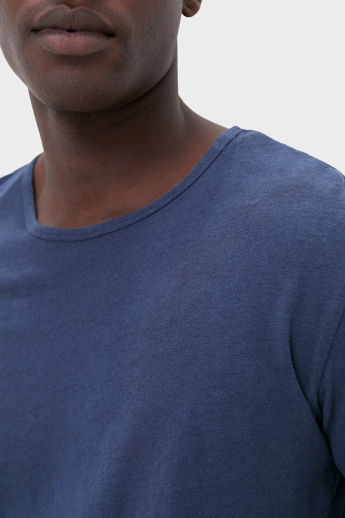 Nautical Blue Drift Linen Tee, a classic, effortless piece with a slightly slubbed texture, epitomizes high-end summer comfort and fun style.