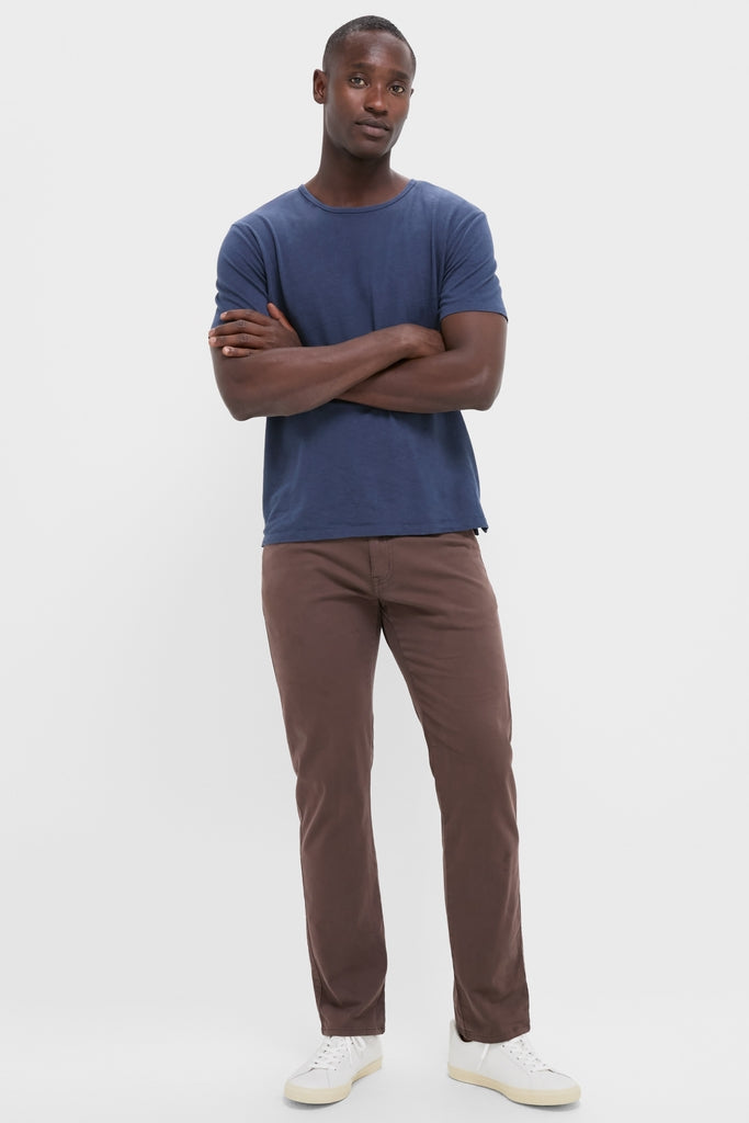 Man wearing the Nautical Blue Drift Linen Tee, a classic, relaxed-fit top perfect for an effortless, high-end style. Ideal for a fun, summer-casual look.