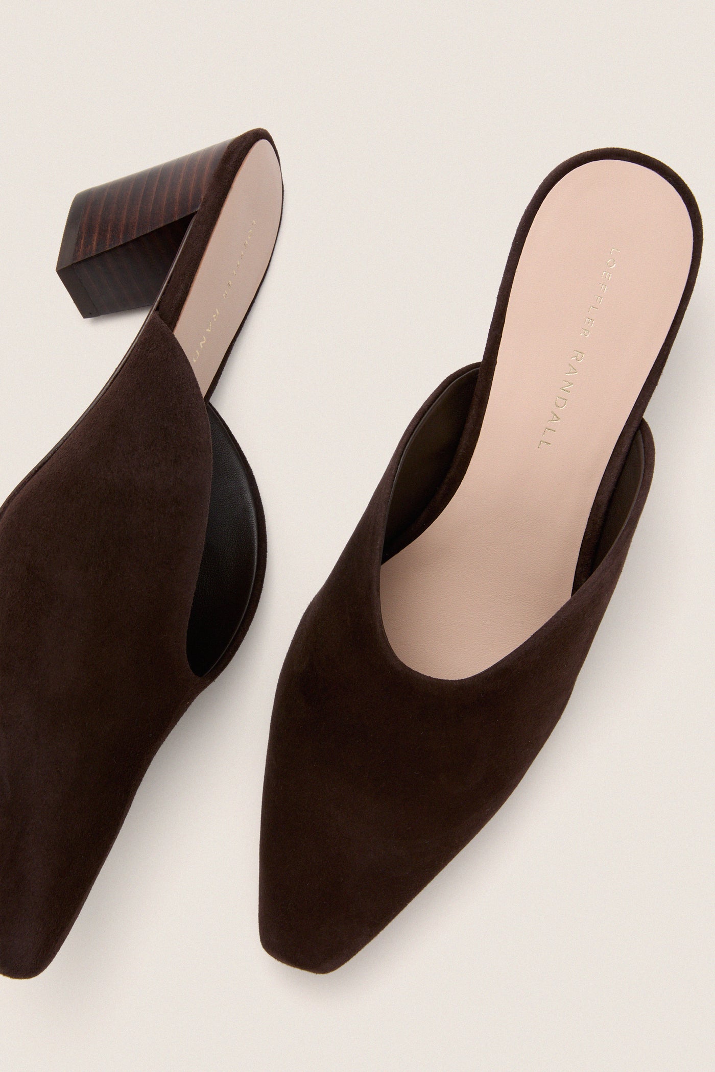 Tmoro Suede Perry Heels: Classic dark brown suede mules with a pointed toe and slanted block heel, effortlessly blending high-end style with fun versatility.