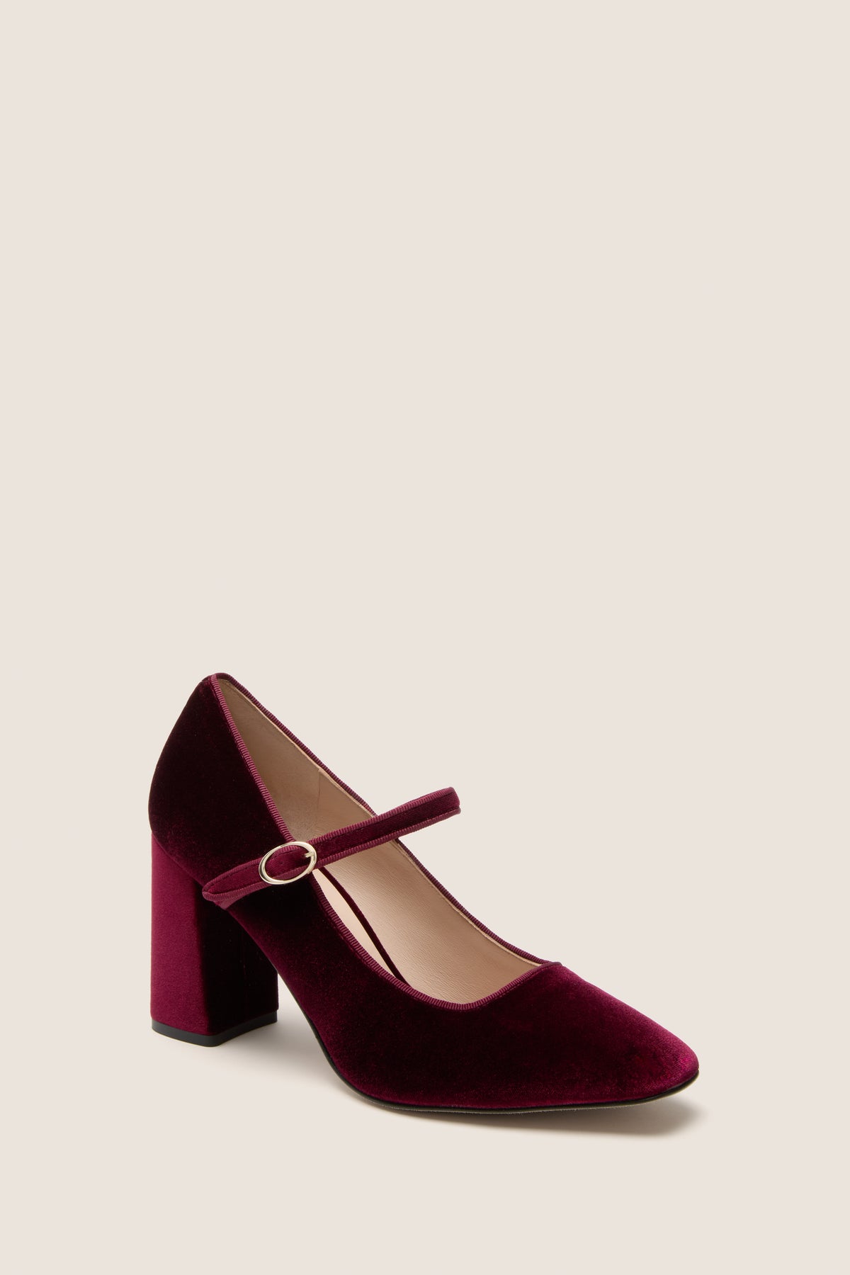 Oxblood Velvet Julia Heels: Classic Mary-Jane style in luxurious velvet with a fun, adjustable gold buckle strap and effortless block heel, embodying high-end elegance.