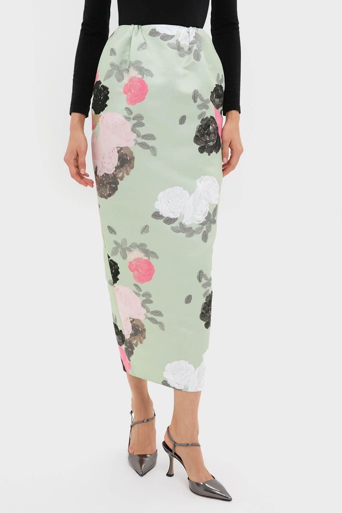 Sage Green Auscot Rose Damian Skirt: classic, high-end midi pencil skirt with painterly rose print, fluid silk-satin feel, paired with metallic-gray heels for an effortless, fun look.
