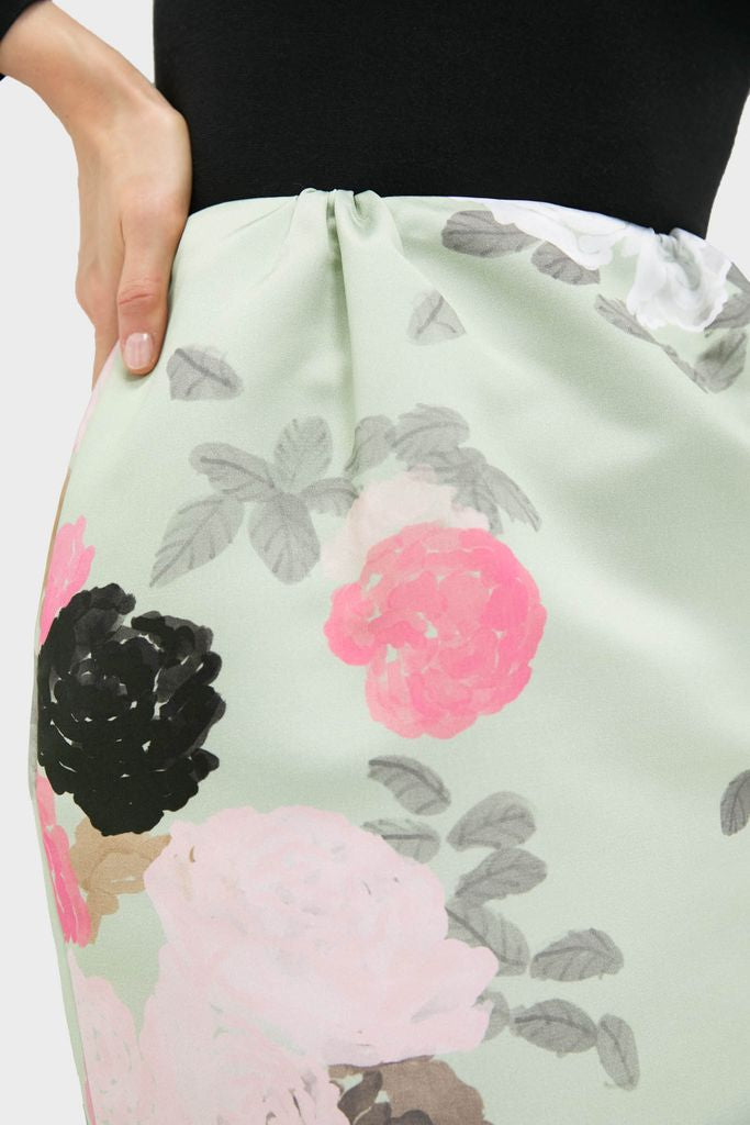 Effortlessly chic, the Sage Green Auscot Rose Damian Skirt features a painterly rose print and a classic pencil silhouette, perfect for high-end, fun styling.