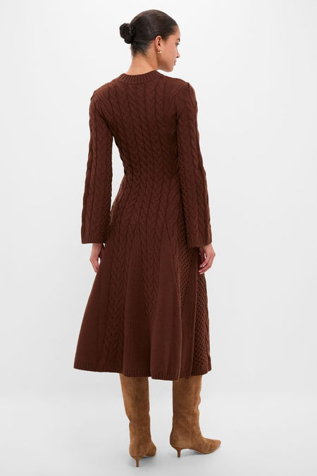 Woman modeling the Chocolate Cable Knit Fernie Midi Dress with classic, effortless elegance, paired with high-end tan suede knee-high boots, embodying a fun, confident style.