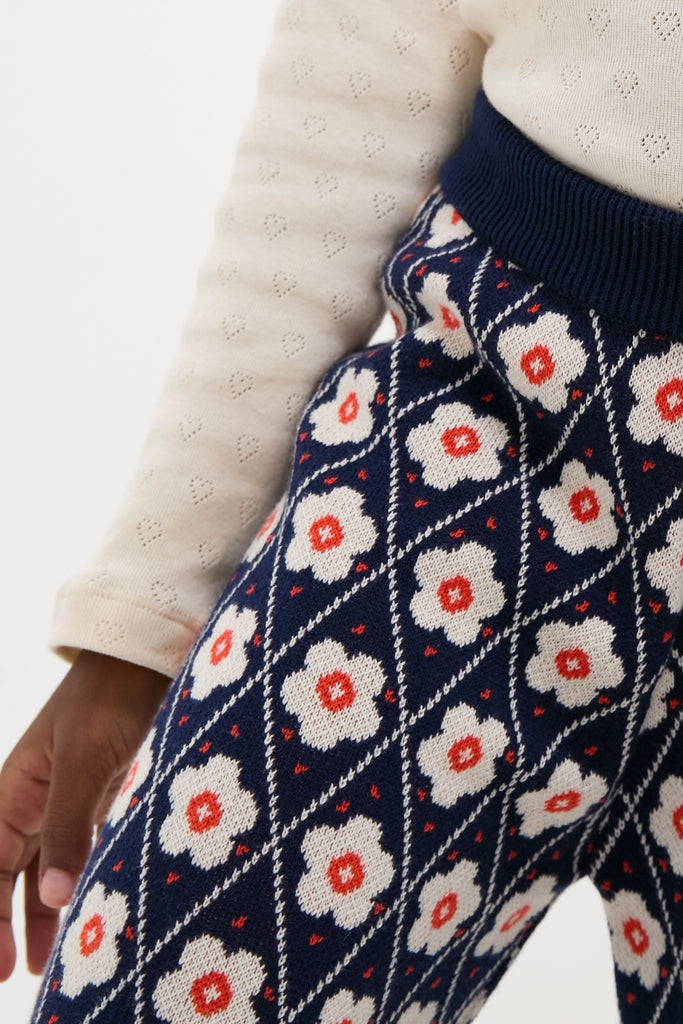 Navy Flower Mathilda Pants showcase a classic, effortless style with an elastic waistband and straight-leg design, featuring a fun, high-end diamond grid floral pattern.