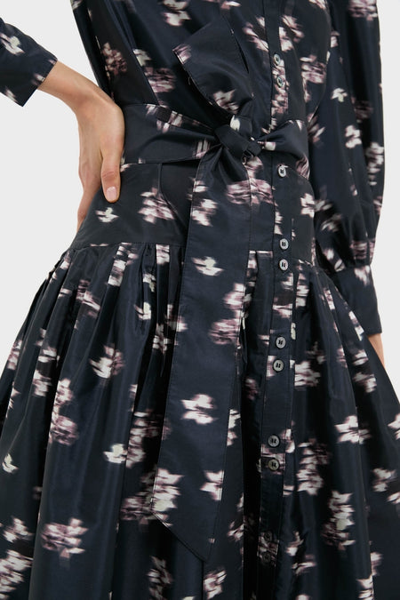 Classic Lebombo Black Nora Midi Dress with button-down bodice, abstract floral print, and self-tie waist. Effortless, high-end style perfect for fun occasions.