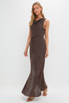 Model wearing the Chocolate Serine Maxi Dress with a cowl neckline, self-tie belt, and side slits, embodying a classic, effortless, and high-end style.