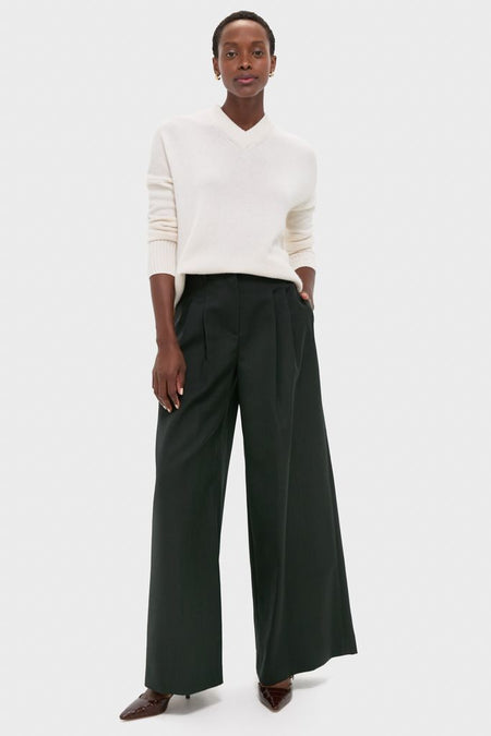 Ivory Cashmere Cassie V-Neck Sweater in a classic, effortless style, featuring a relaxed fit with ribbed finishes, epitomizing high-end, fun fashion for versatile sophistication.