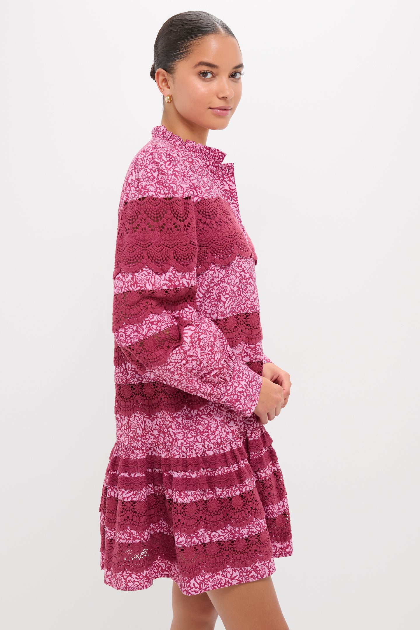 Lace Trim Maroon & Pink Floral Emmie Mini Dress worn by a woman, showcasing its classic ruffle collar, effortless blouson sleeves, and fun lace trim details.