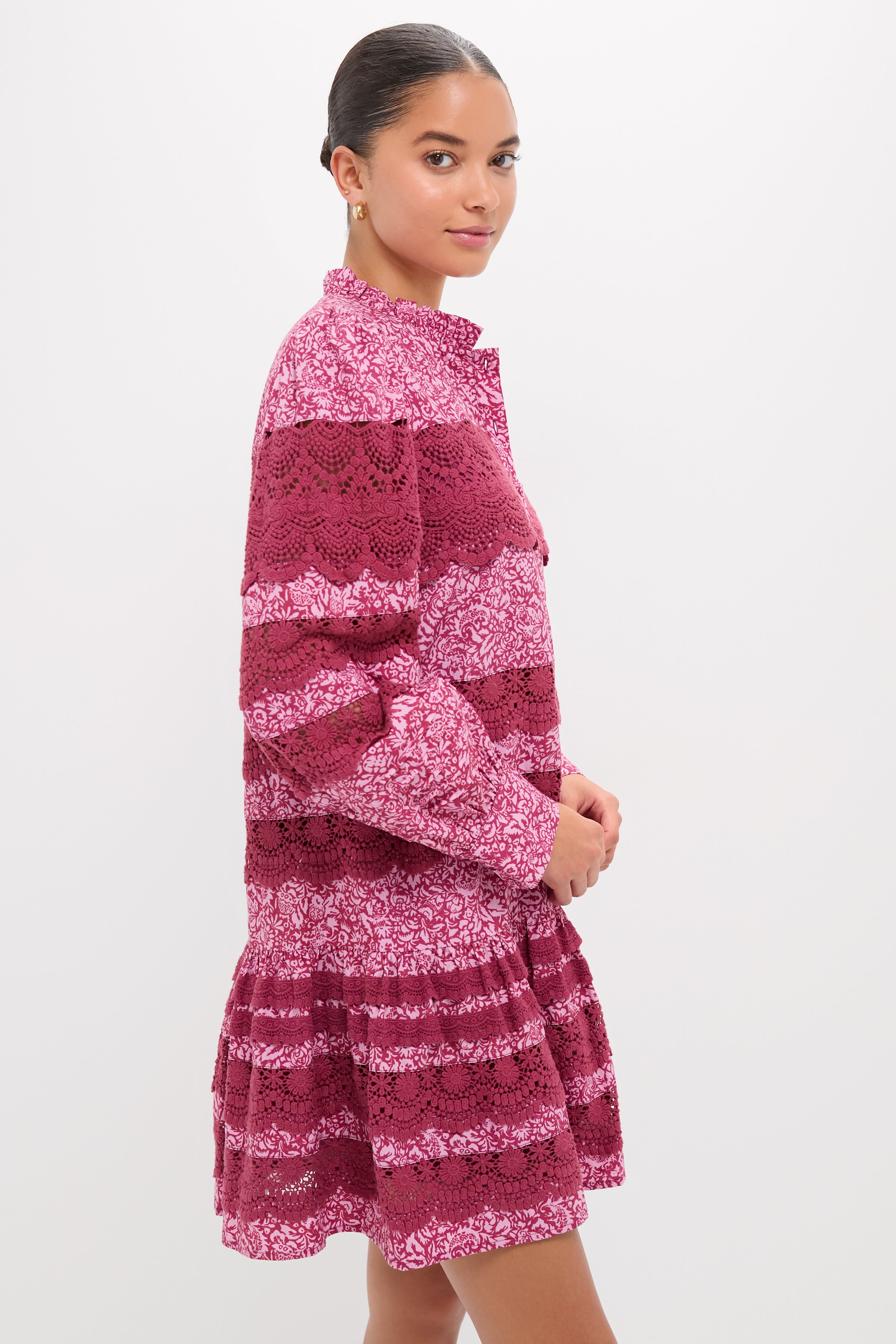 Lace Trim Maroon & Pink Floral Emmie Mini Dress worn by a woman, showcasing its classic ruffle collar, effortless blouson sleeves, and fun lace trim details.